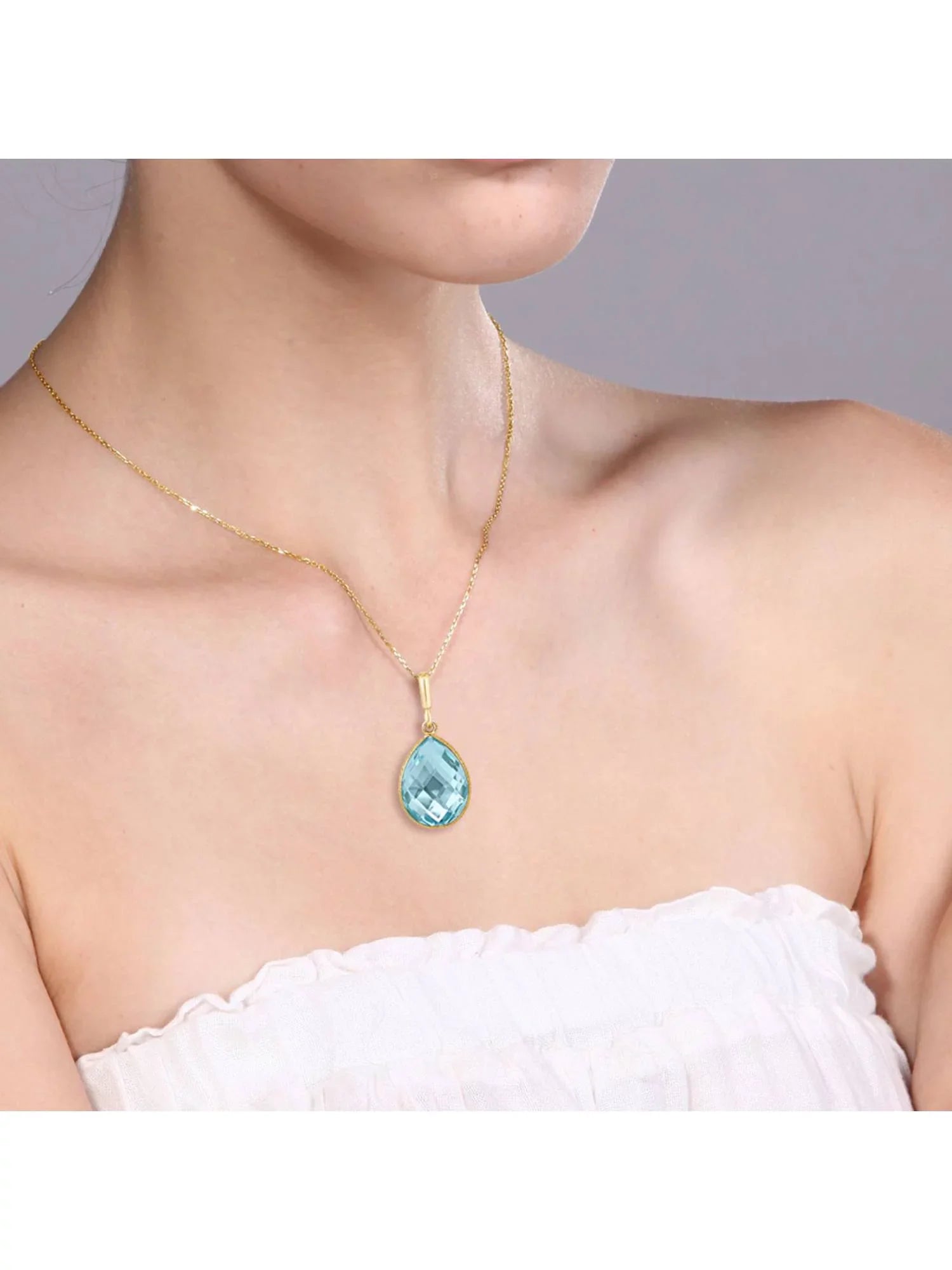 Gem Stone King 9.00 Ct Blue Topaz 16x12mm Pear Shape 18K Yellow Gold Plated Silver Pendant 18 inches Chain