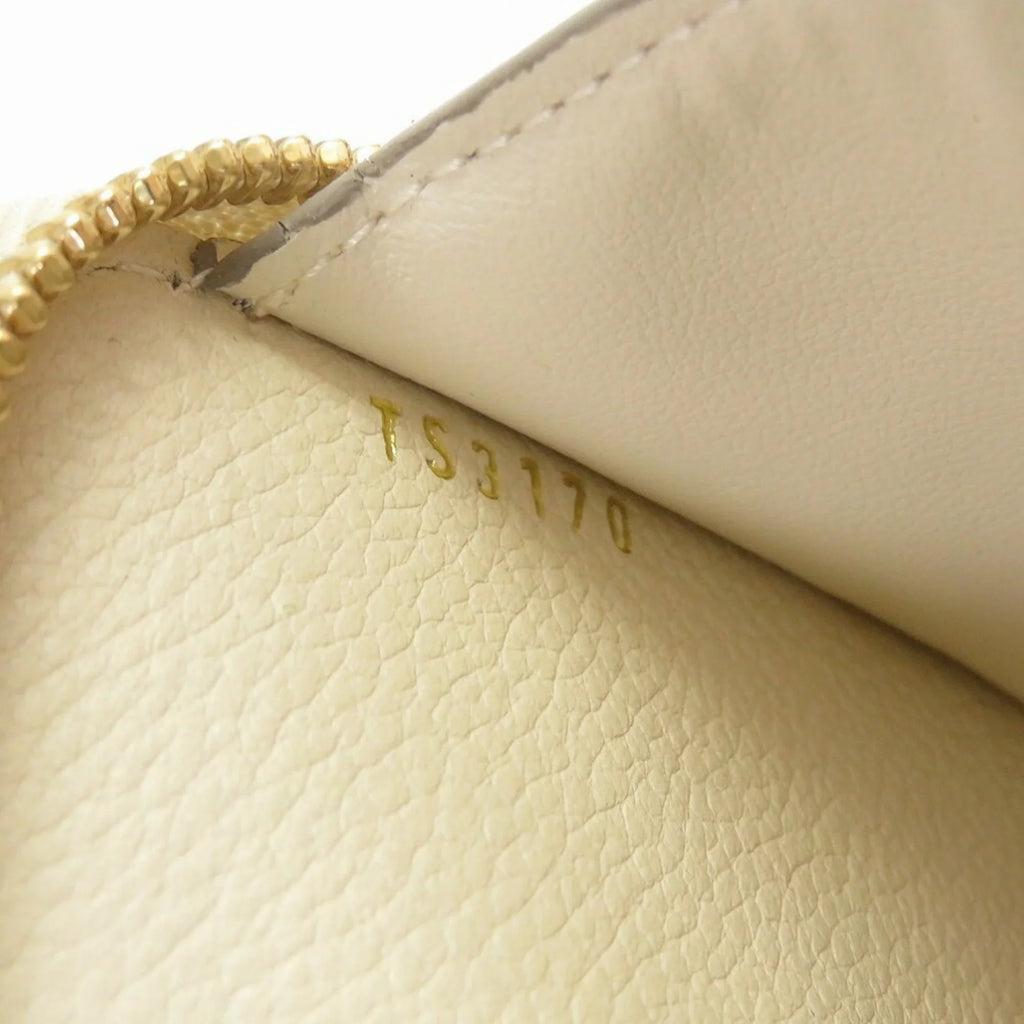 Pre-Owned Louis Vuitton Monogram Implant Portefeuille Secret M93432 Neige Bifold Wallet Round (Good)